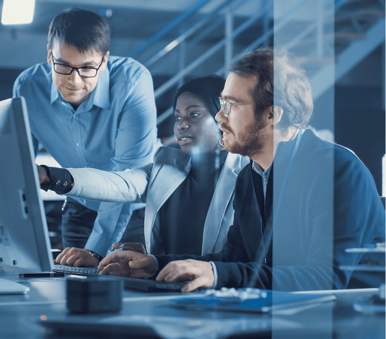 Colleagues discussing project at computer